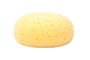 round yellow natural facial cellulose sponge isolated on white b