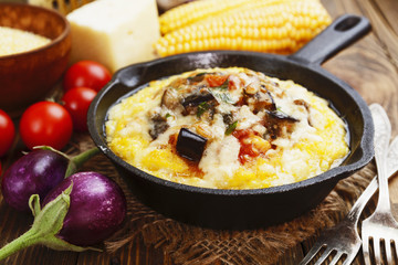 Polenta baked with vegetables and cheese