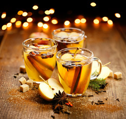 Heated cider with added spices and citrus
