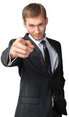 Young businessman pointing on you