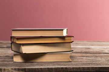 Retro books on wooden desk
