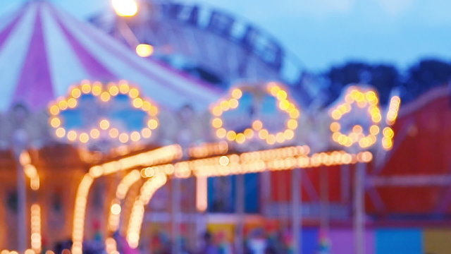 Blur or defocus Fun fair or Amusement park.
