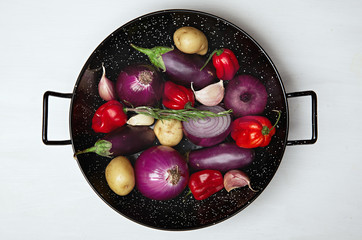Vegetables in wok plate