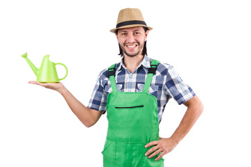 Young cheerful gardener with watering can isolated on white