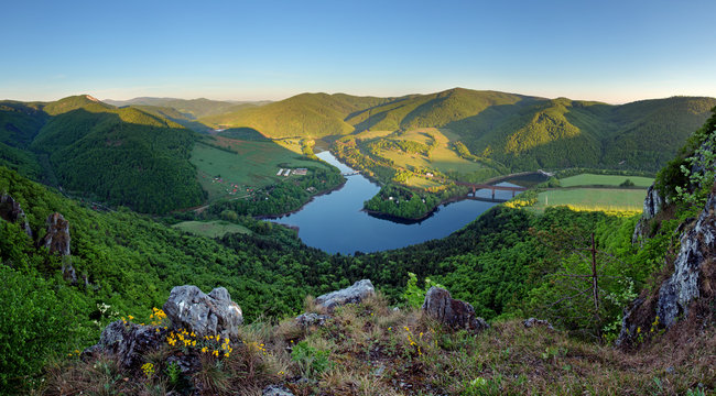 Beautiful Slovakian panoramic landscape with a rock and river do