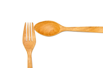 Spoon and fork made of wood on white background