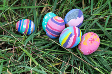 Easter eggs in Green Grass. Selective focus.