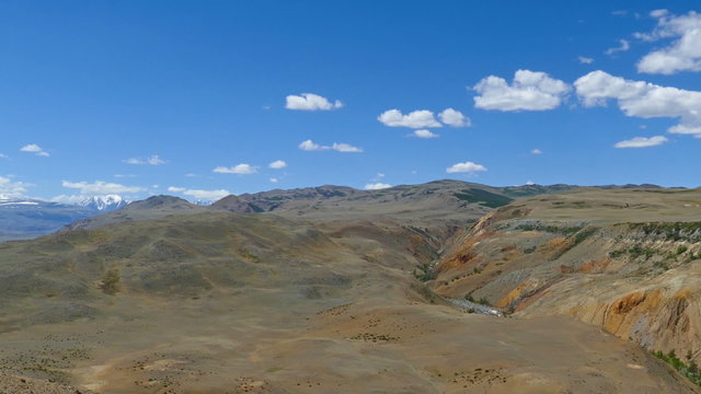 Landscape with deposit of colorful clay in the Altai Mountains or Mars valley, pan view
