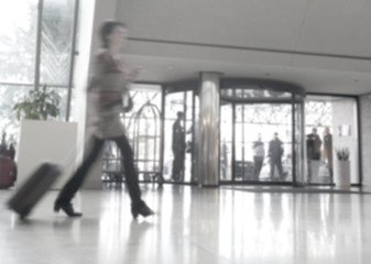 abstract blur of passengers rushing at big city