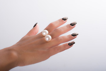 Nail art and pearls