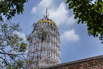 Antique pagoda and ruined sanctuary in Wat Putthaisawan, Ayutthaya Thailand