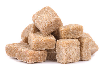 cubes of sugar cane brown isolated on white background