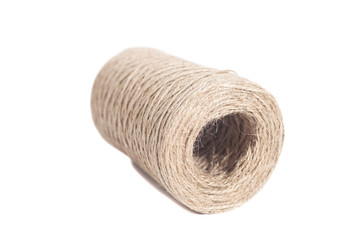 Skein of jute twine on white background