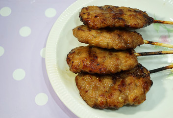 thai pork grill on white dish