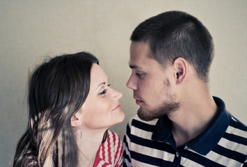 Happy Young Couple looking at each other