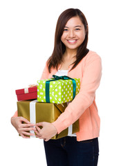 Asian young woman hold with lots of present box