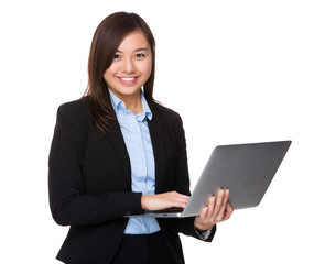 Young businesswoman use of the notebook computer