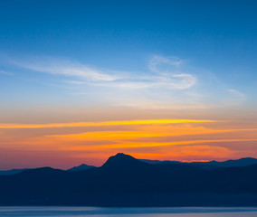 Fototapeta premium sunset over a hills background