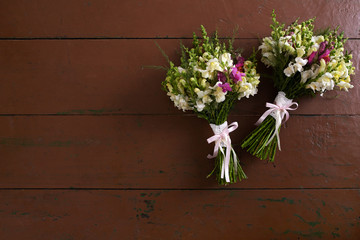 There are two wedding bouquets