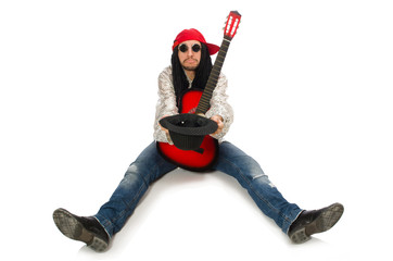 Naklejka premium Male musician with guitar isolated on white