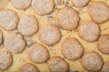 Homemade wholemeal cookies on parchment