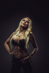 Sexy blond woman in black bra.