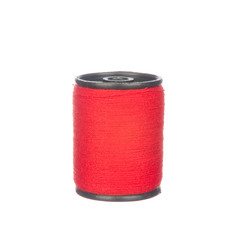 Colourful red thread isolated on white background