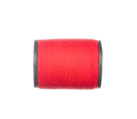 Colourful red thread isolated on white background