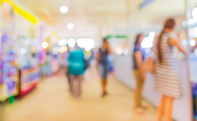 blurred image of people at shopping mall