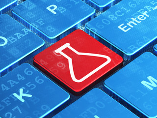 Science concept: Flask on computer keyboard background