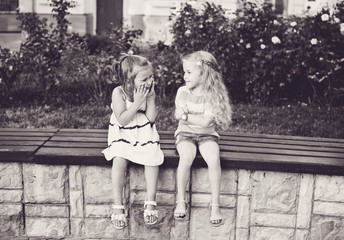 Fototapeta na wymiar two happy little girls