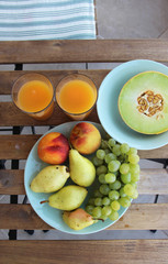 Mix of fruits on the wooden table