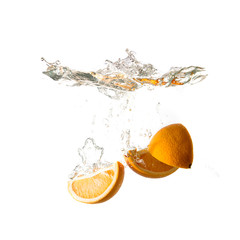Fototapeta na wymiar Orange splash on water, isolated on white background