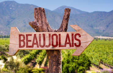 Beaujolais wooden sign with winery background - obrazy, fototapety, plakaty
