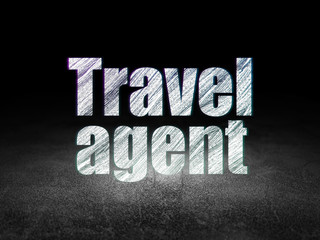 Fototapeta na wymiar Vacation concept: Travel Agent in grunge dark room