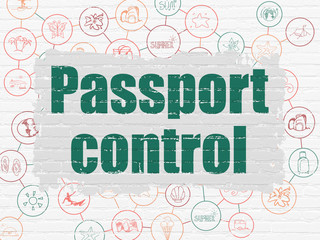 Vacation concept: Passport Control on wall background