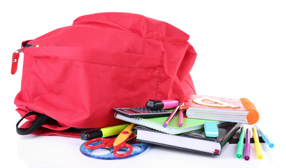 Red bag with school equipment isolated on white