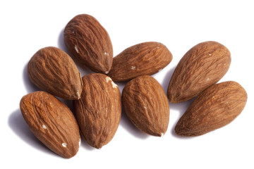 Pile of almonds isolated on white.