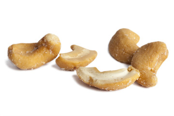 Salted peanuts isolated on white.