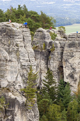 Cliffs,  rocky towers with mountain climbers.