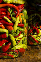 Traditional Jarred yellow, green, red, hot peppers. High resolution image.