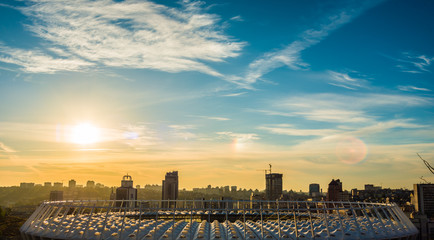 View at main soccer stadium, sunset and the view of Kyiv