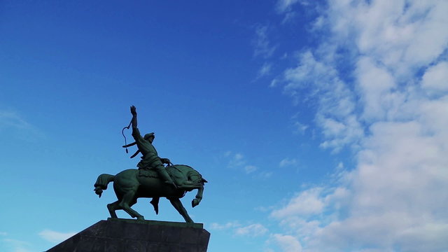 Floating clouds over monument of Salavat Yulayev