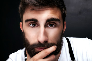 Portrait of handsome man with beard.