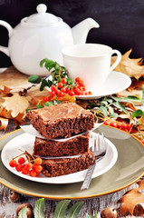 Chocolate brownies, cake or chocolate squares, Thanksgiving or autumn table setting