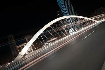 Modern city steel bridge background at night
