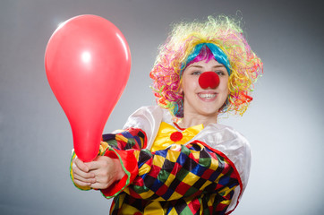 Funny clown in comical concept