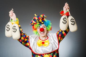 Funny clown in comical concept
