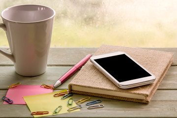 Cellphone,smart phone,phone on notebook  with pen,notepad 