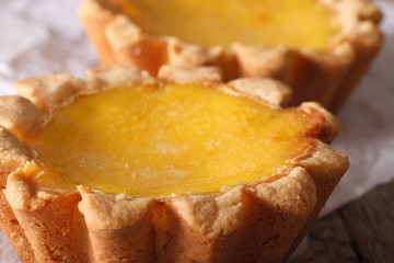Tasty Egg Tart on a table macro. horizontal
